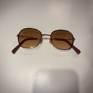 Rose pink/brown and gold sunglasses.